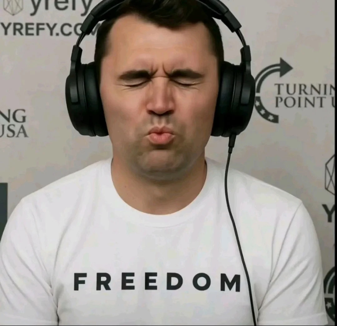 A man with headphones on his face.