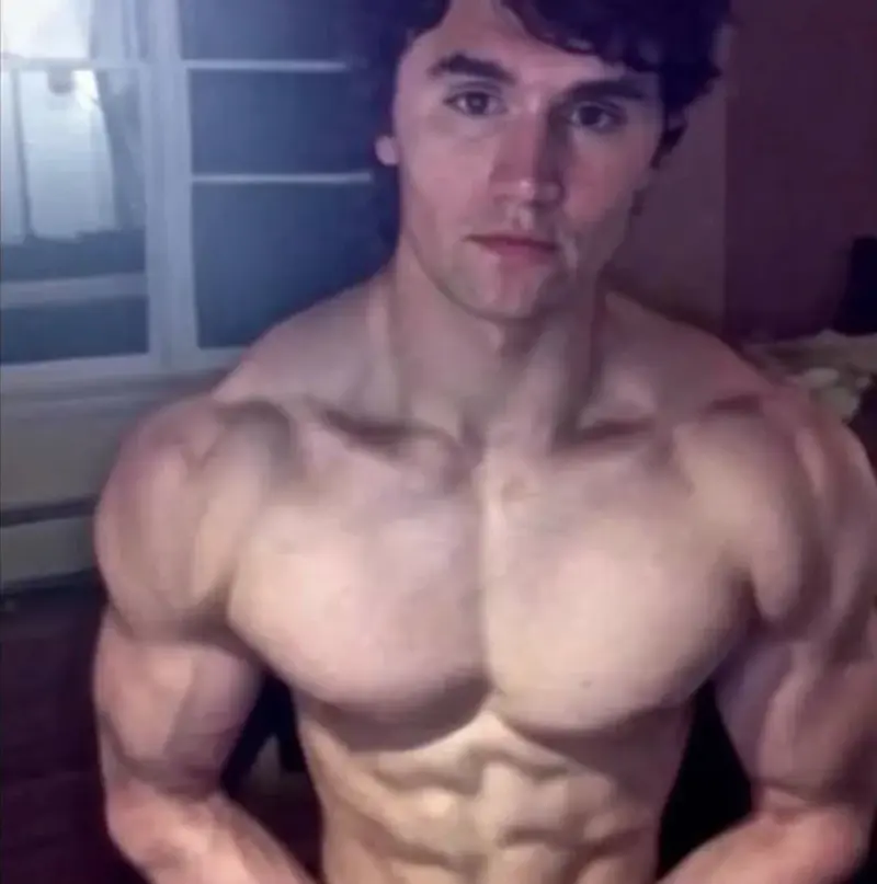 A man with a muscular body and no shirt.