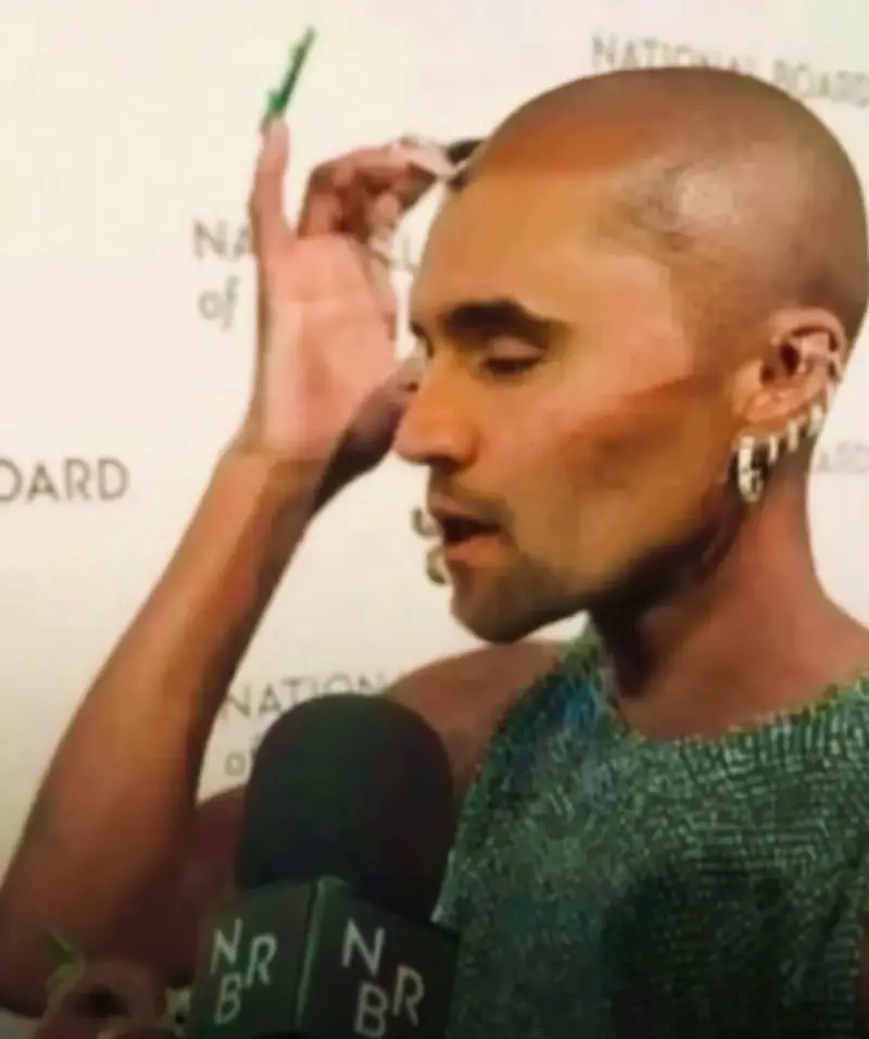 A man with a microphone and a microphone.