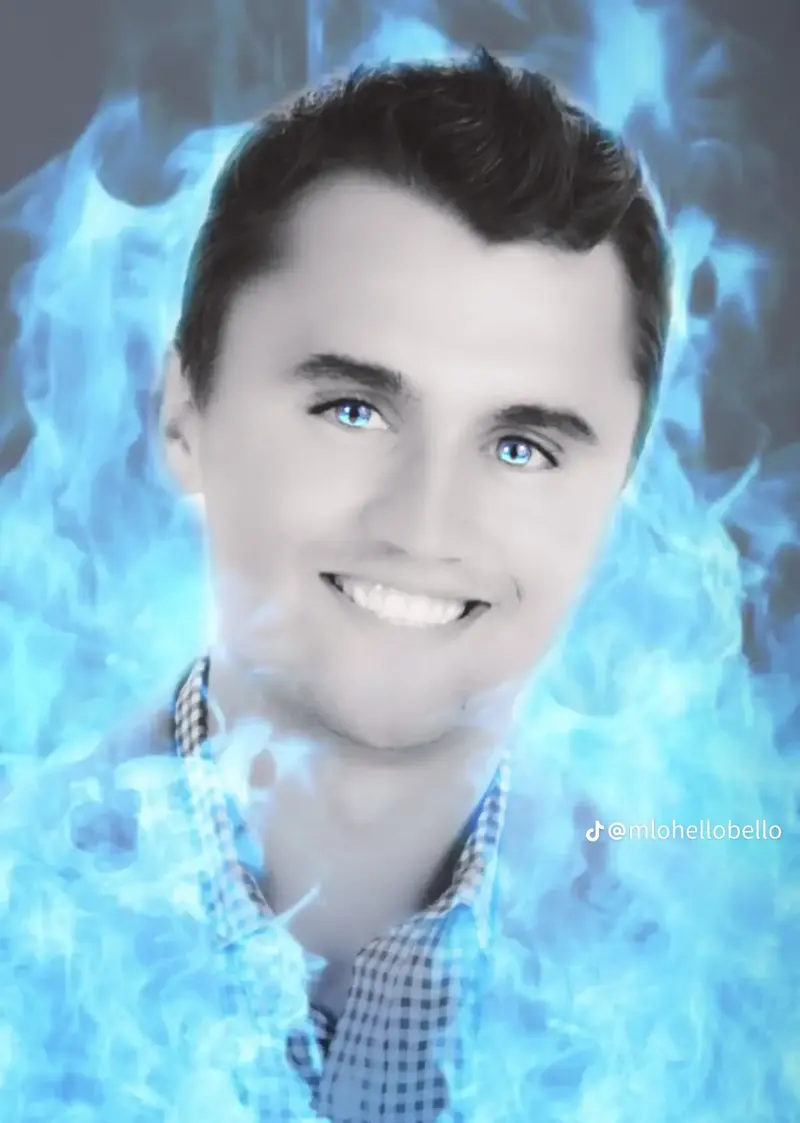 A man with blue smoke in his mouth.