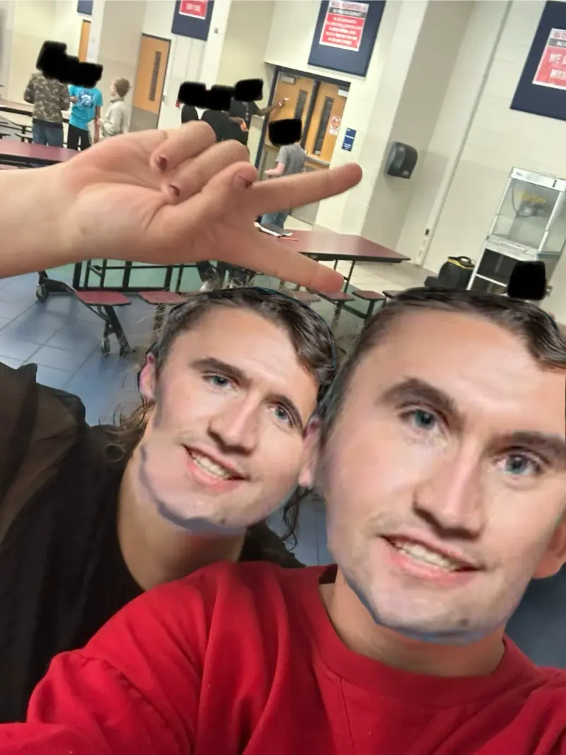 Two people are taking a selfie