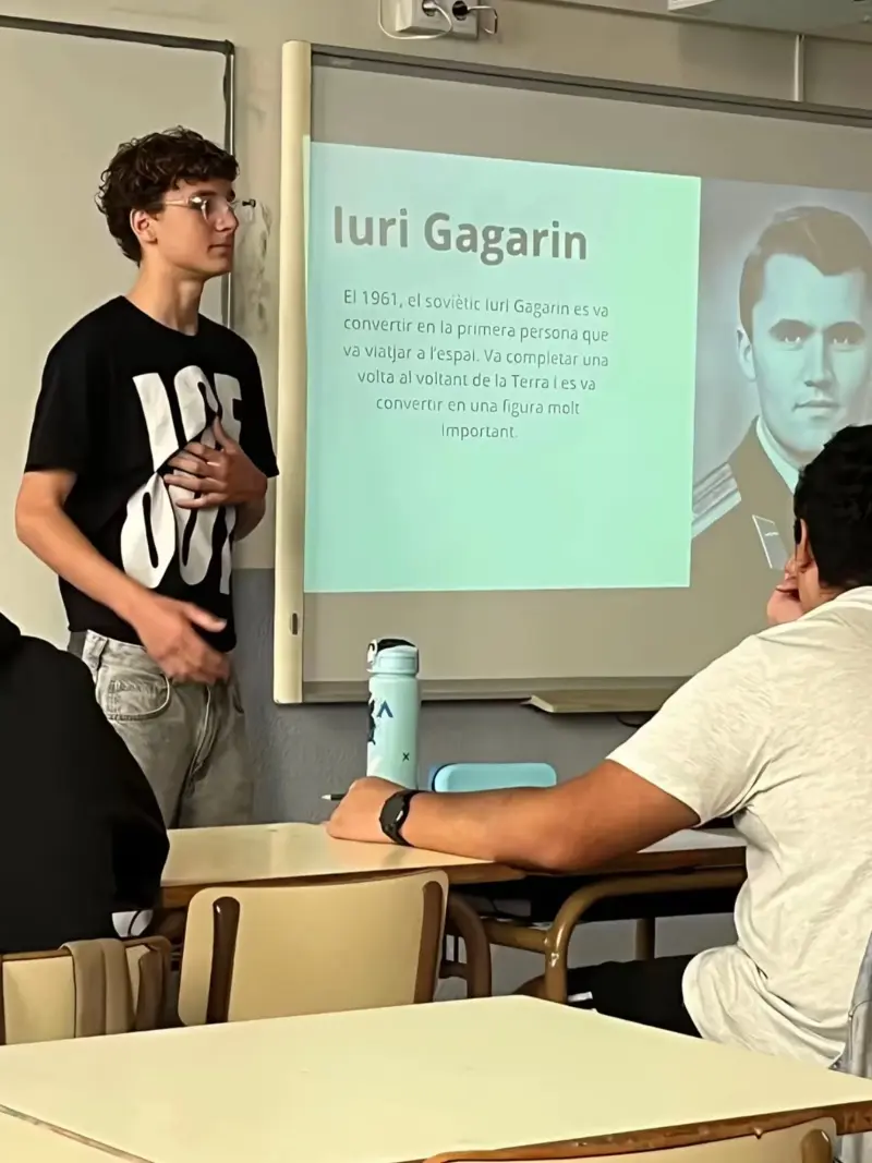 A man standing in front of a whiteboard.