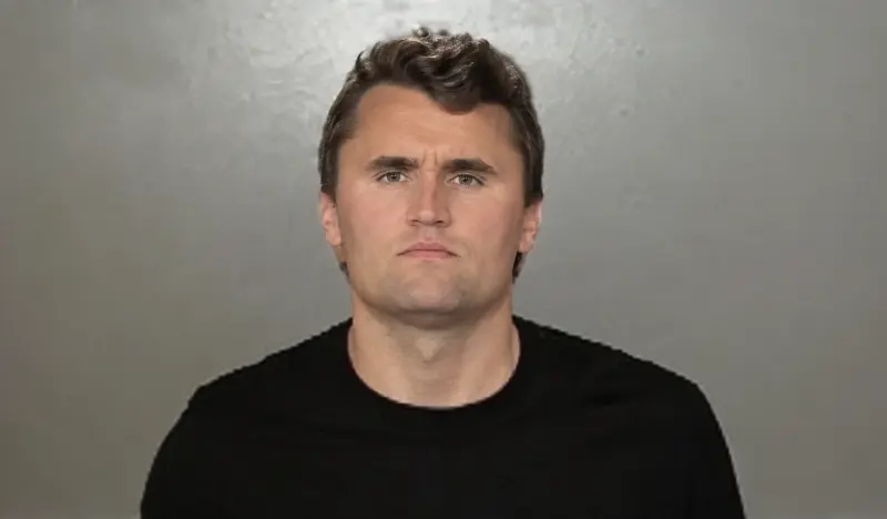 A man in a black shirt.