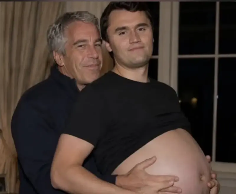 A man hugging his pregnant while he is holding it.