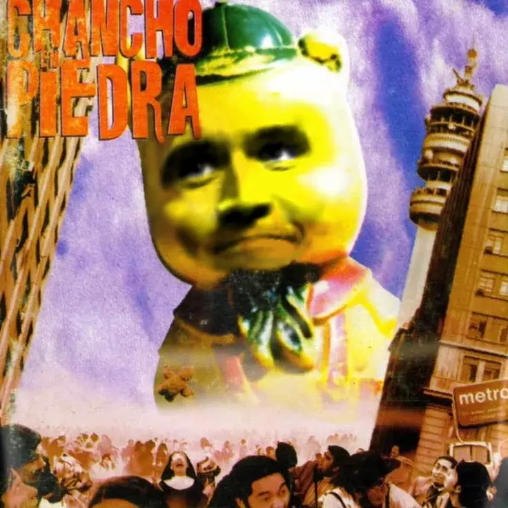A picture of a man in a yellow shirt and a green hat.