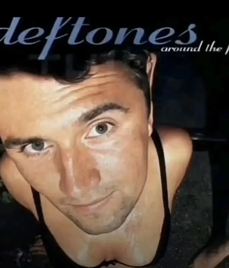 A man with a black shirt and a black shirt.